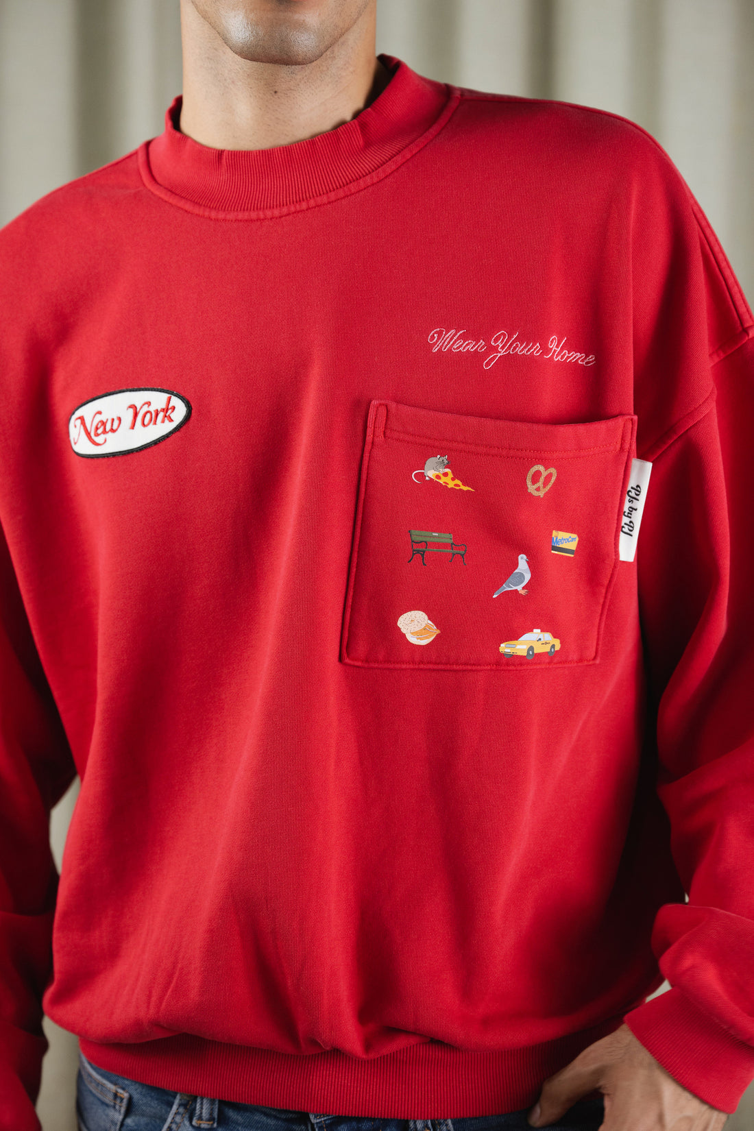 New York Crewneck in Apple Red — pocket detail